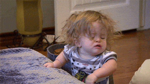 Discouraged toddler starts crying